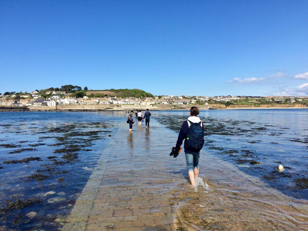 Racing the tide on the causeway at St Michael's Mount